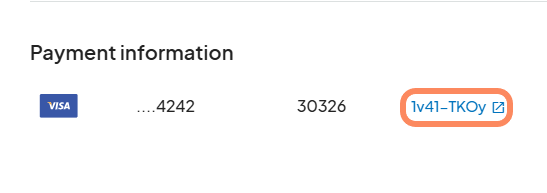 A section showing the payment information for a ticket purchase, displaying a Visa card ending in 4242, and a clickable link labeled '1v41-TKOy'.